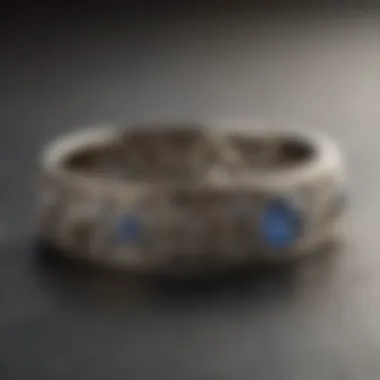 Close-up of a vintage-inspired wedding band with intricate engravings