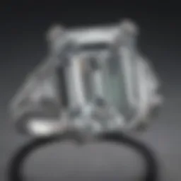 Close-up of an emerald cut white sapphire engagement ring showcasing its brilliance and clarity