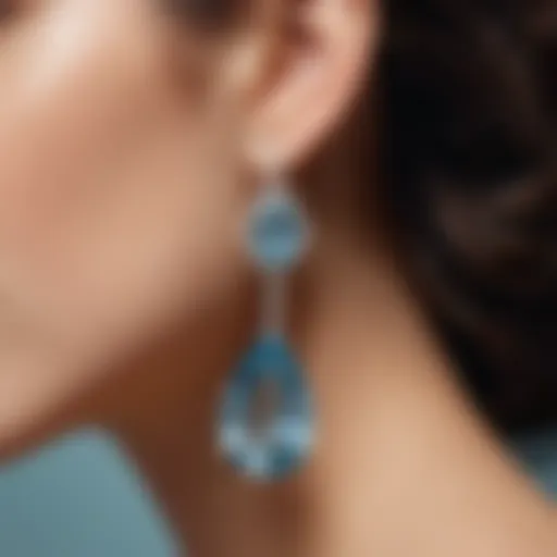 Close-up of blue nile aquamarine earring showcasing its clarity and color