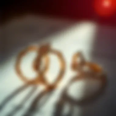 Historical sketches of twisted band ring designs from different eras.