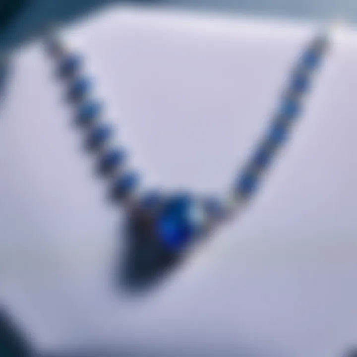 An elegant sapphire necklace displayed elegantly on a velvet surface