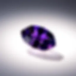 Vibrant purple tanzanite gemstone against a neutral backdrop