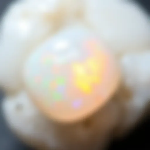 Close-up view of a white opal stone displaying its unique play of color
