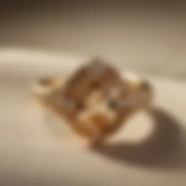 Elegant Vintage Gold Ring on Soft Fabric An elegant vintage gold ring set against a soft fabric background