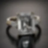 Elegant rectangle shape diamond ring resting on a velvet surface