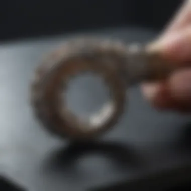 A close-up view of a third hand tool in action, showcasing its intricate design and utility in jewelry making.