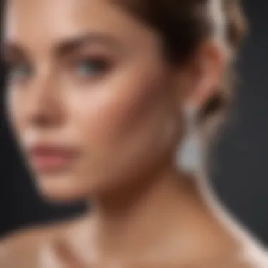 Elegant Display of One-Carat Diamond Earrings Elegant setting showcasing one-carat diamond earrings worn by a model